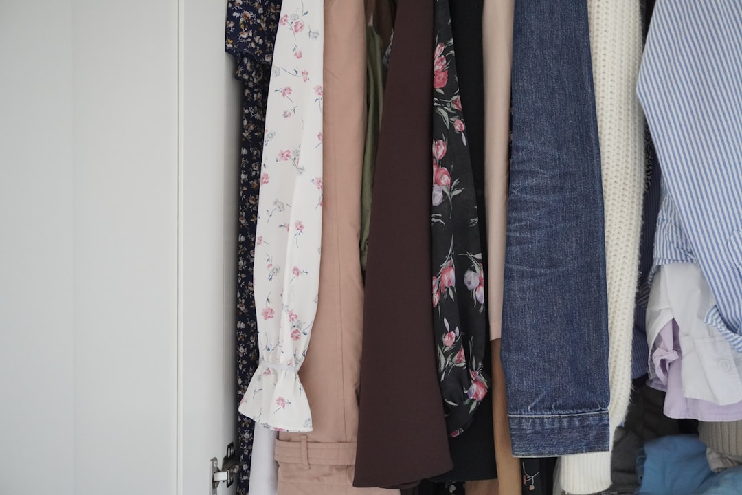 clothes hanging organized closet